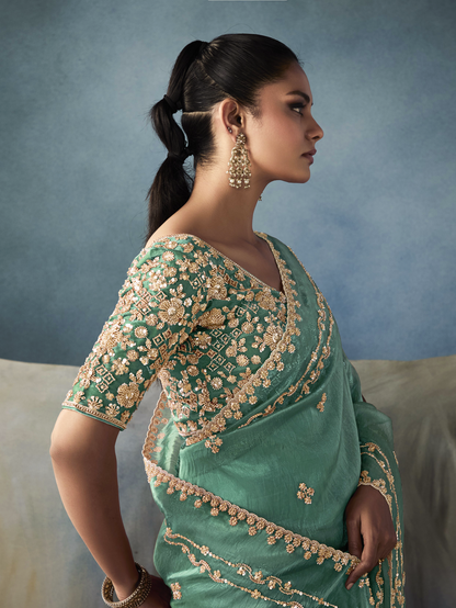 Dhiyona KM Women Sea Green Tissue Embroidered Fancy Heavy Border Saree