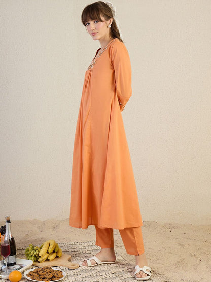 Women Floral Embroidered Cotton Kurta with Trousers