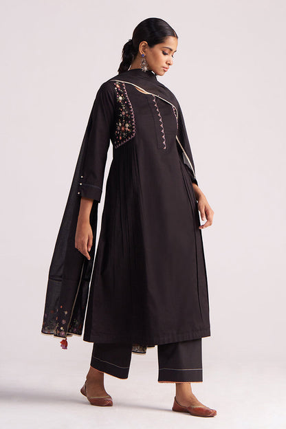 Woman wearing a Black Embroidered Kurta Set on a white background