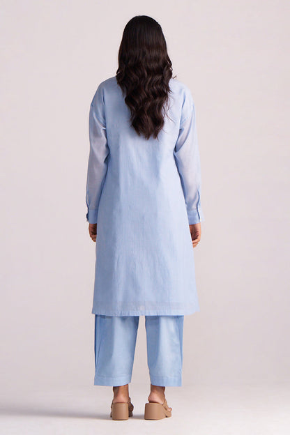 Woman wearing a Soft Sky Blue Mul-Mul Co-ord Set on a plain background