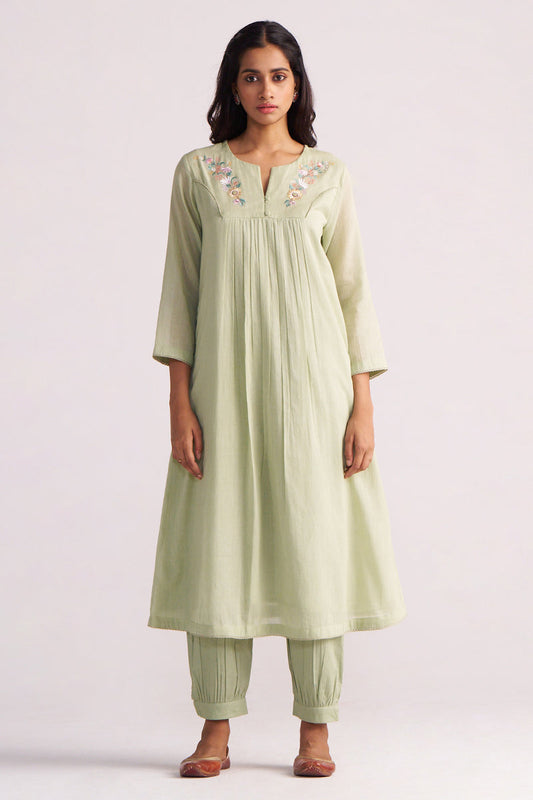 Woman wearing a Quient Green Mul-Mul Co-ord Set on a white background