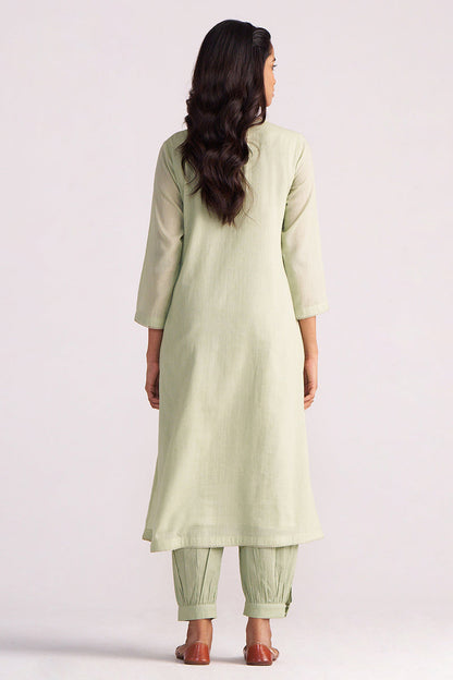 Woman wearing a Quient Green Mul-Mul Co-ord Set on a white background