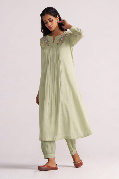 Woman wearing a Quient Green Mul-Mul Co-ord Set on a white background