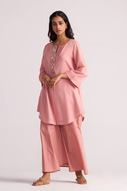 Woman wearing a Rose Tan Mul-Mul Co-ord Set with a plain background