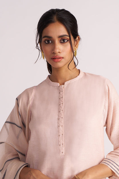 Woman wearing a Sepia Rose Woven Chanderi Kurta Set against a plain background