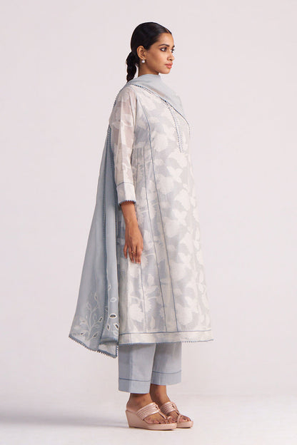 Woman wearing a Grey Woven Pheran Kurta Set on a white background