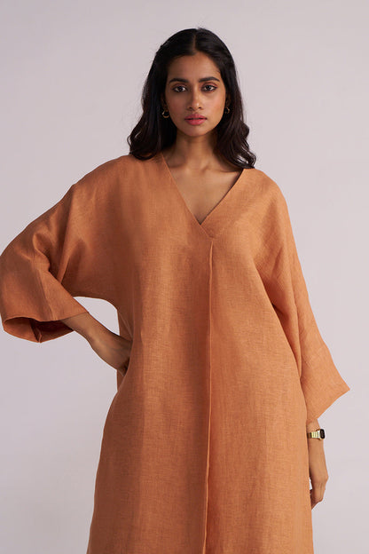 Woman wearing a Sunburn Pure Linen Co-ord Set a plain background