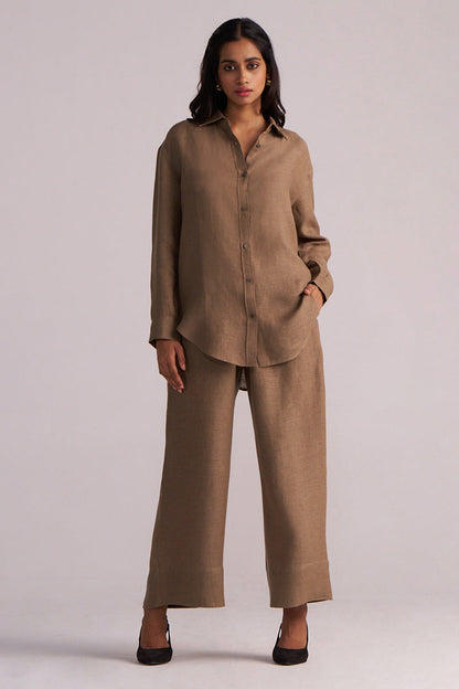 Woman wearing a Woodsmoke Brown Pure Linen Co-ord Set on a plain background