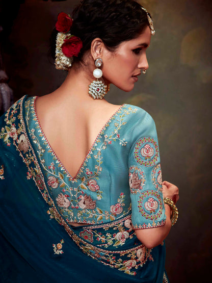 Dhiyona KM Women Teal Blue Designer Organza Silk Saree With Heavy Embroidered Floral Border And Contrast Blouse
