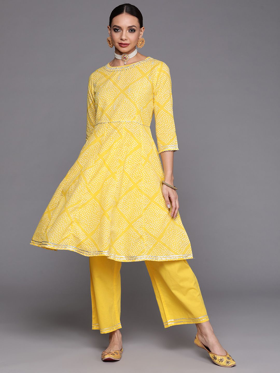 Dhiyona IE Women Yellow Printed Gotta Patti Kurta with Trousers