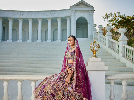 Burgundy net with Coding & Zarkan embroidery  Lehenga choli & Dupatta