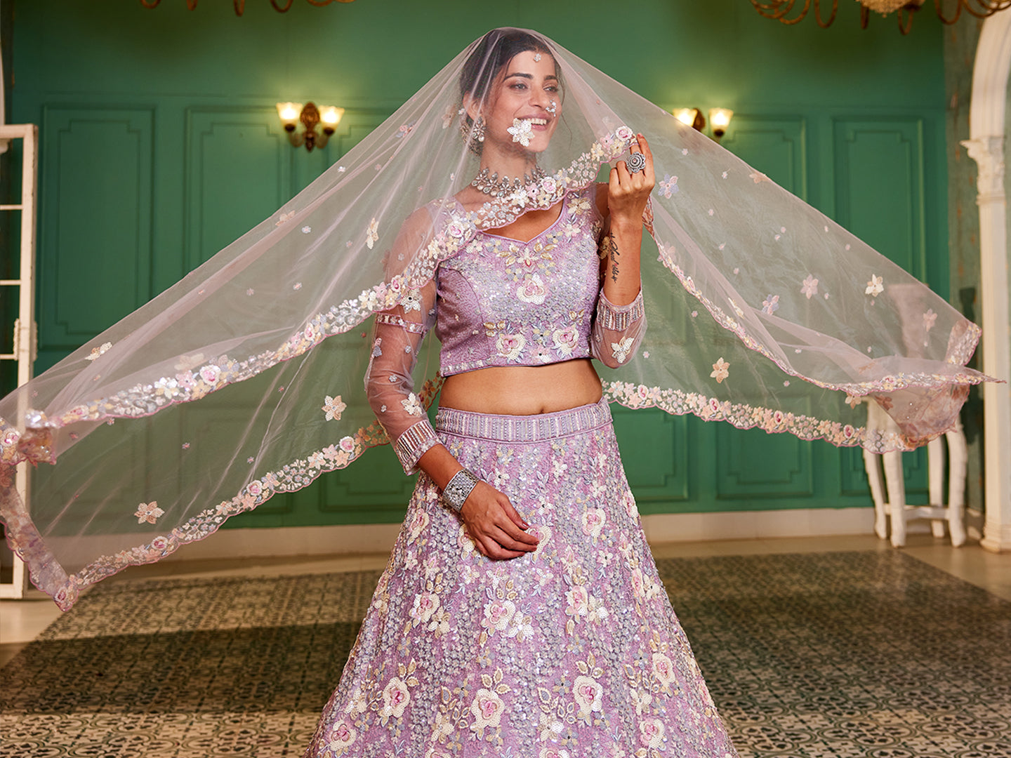 Mauve net with Sequinse & Zarkan embroidery  Lehenga choli & Dupatta