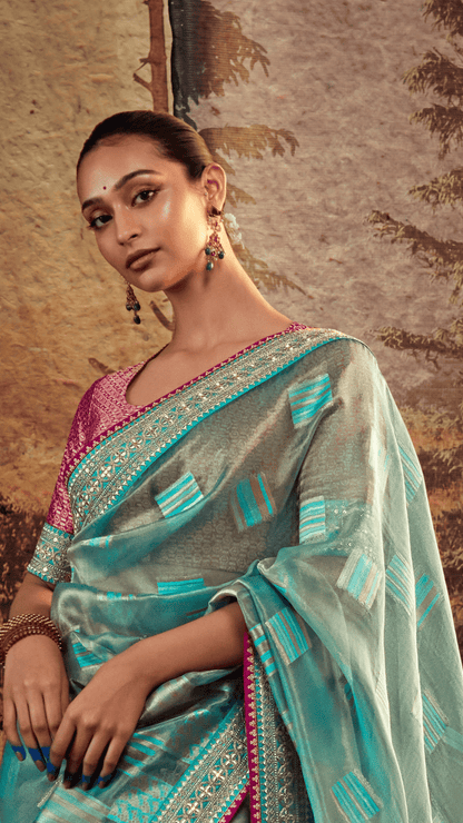 Dhiyona KM Women Royal Radiance “ Blue Jacquard Silk Saree With Rich Red Border