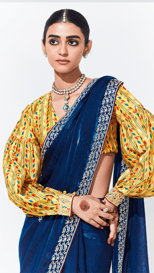 Dhiyona KM Women Royal Blue Silk Saree With Yellow Printed Puff-Sleeve Blouse “ A Perfect Blend Of Tradition & Trend