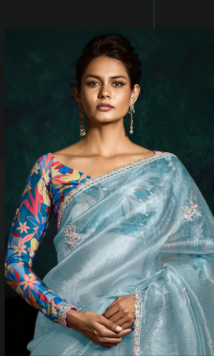 Dhiyona KM Women Sky Blue Designer Organza Saree  “ A Blush Of Elegance