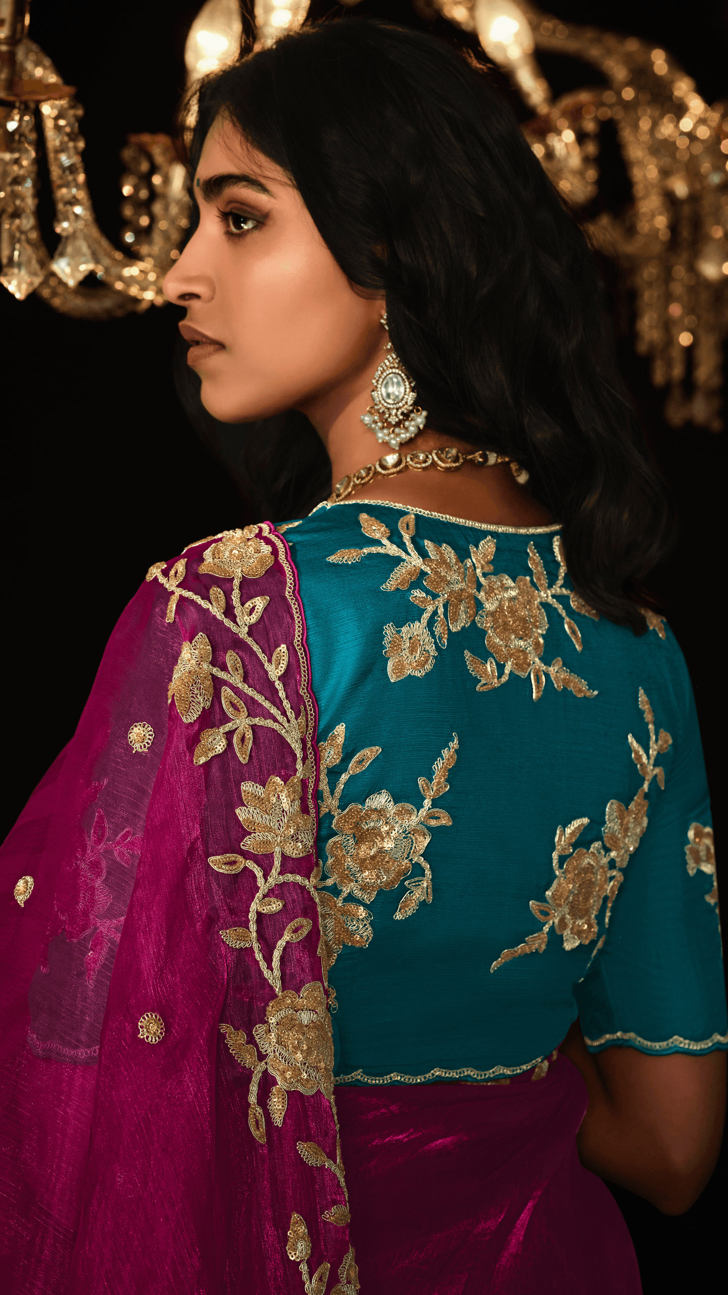 Dhiyona KM Women Red Hand-Embroidered Saree With Teal Blouse