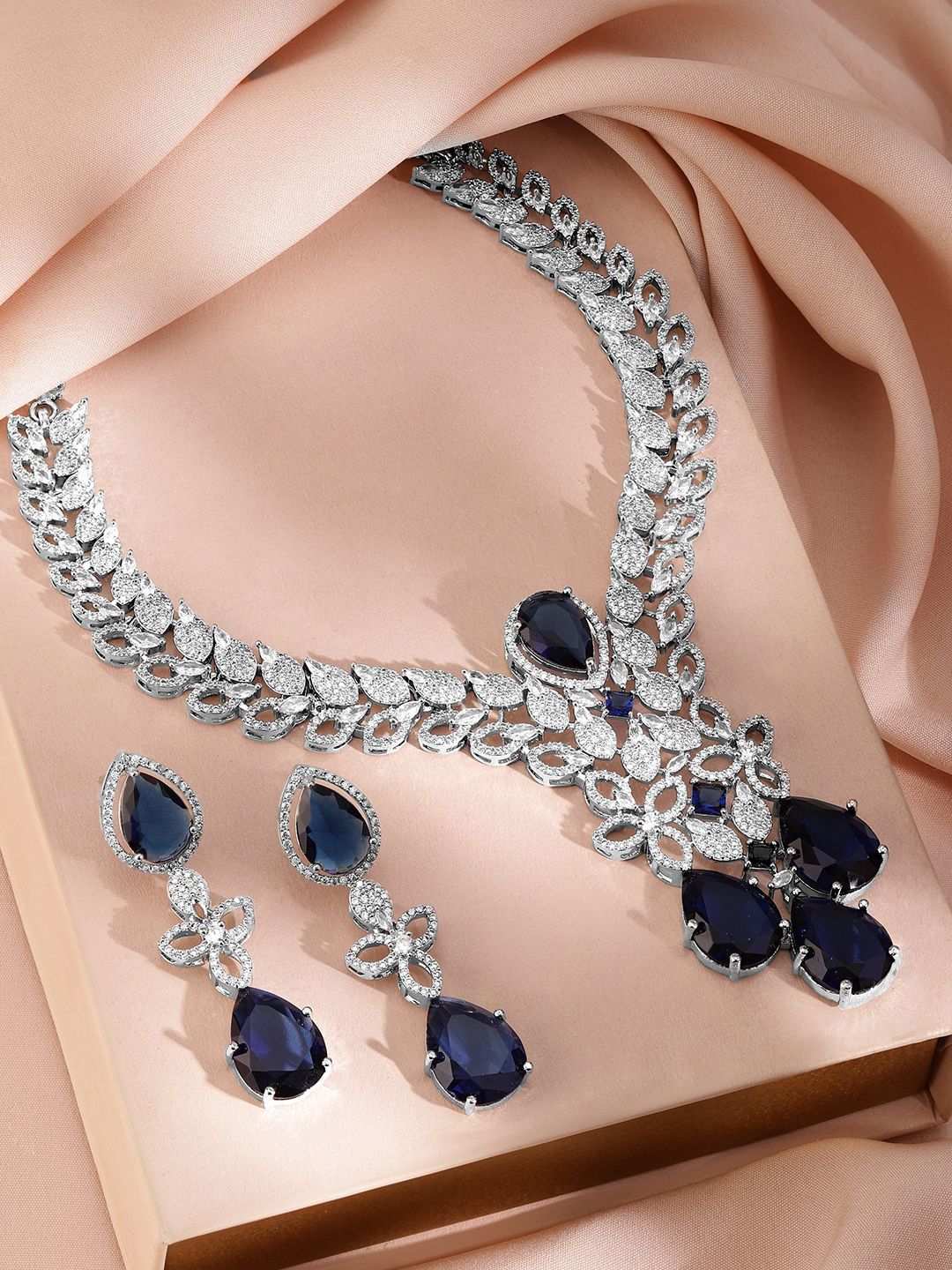Dhiyona RJ Women's Rhodium Plated Blue Sapphire and Cubic Zirconia Studded Premium Jewellery Set