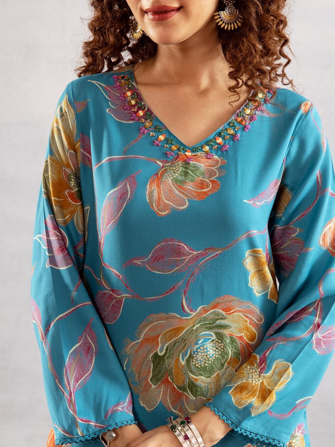 Dhiyona IS Women's Women Floral Printed Regular Kurta with Trousers