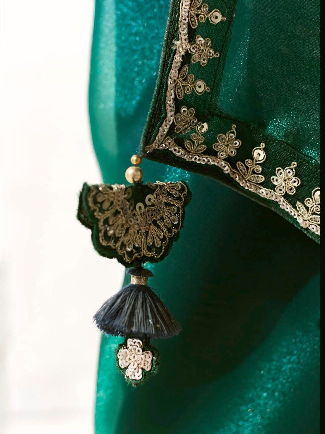 Dhiyona KM Women Peacock-Inspired Tissue Silk Organza Saree With Epeacock-Inspired Tissue Silk Organza Sareembroidered Blouse
