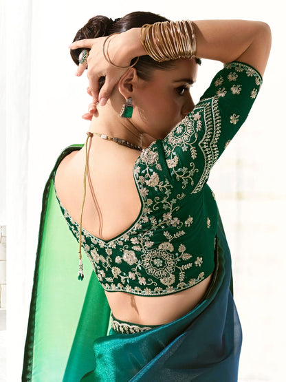 Dhiyona KM Women Peacock-Inspired Tissue Silk Organza Saree With Epeacock-Inspired Tissue Silk Organza Sareembroidered Blouse