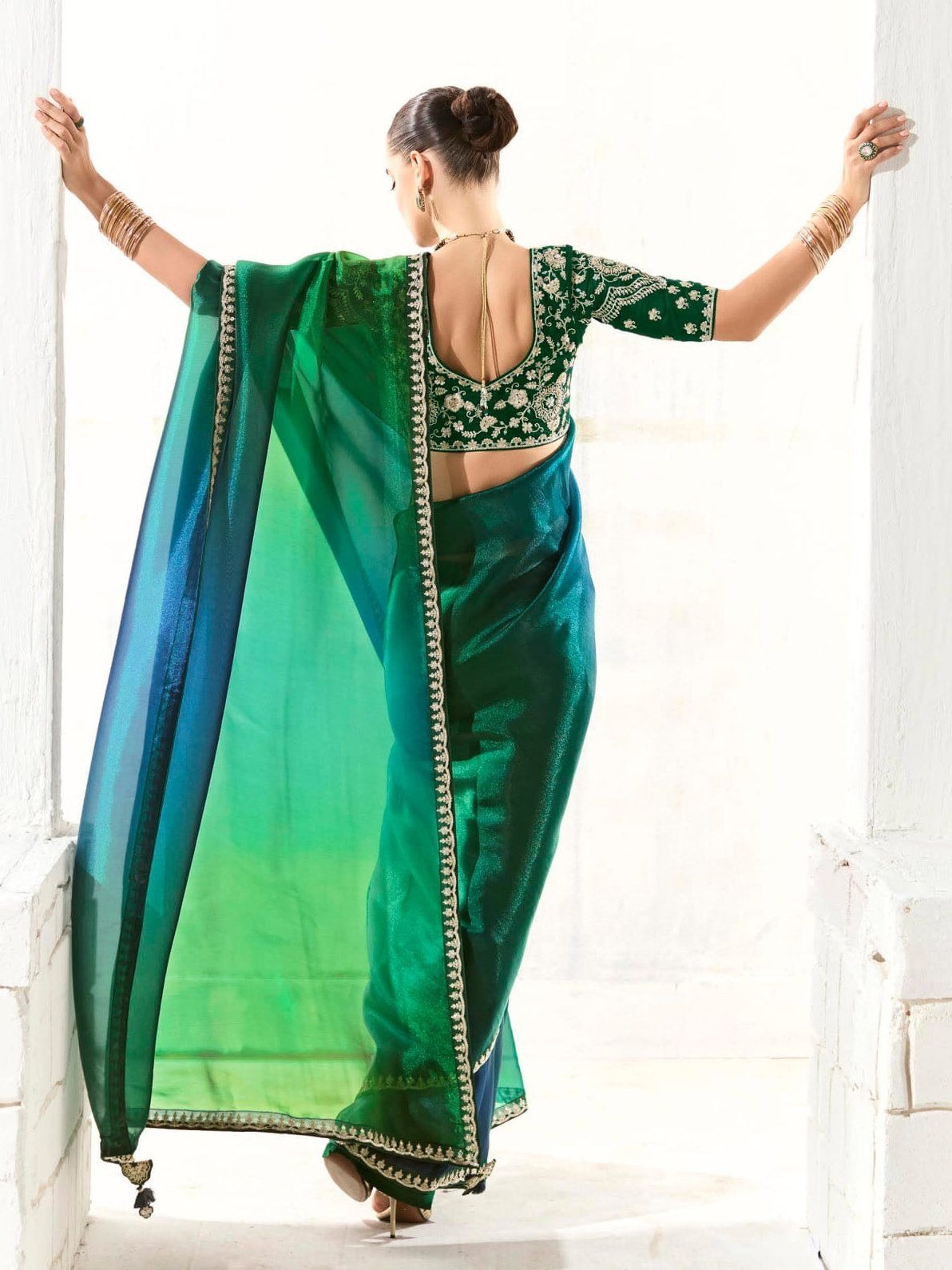 Dhiyona KM Women Peacock-Inspired Tissue Silk Organza Saree With Epeacock-Inspired Tissue Silk Organza Sareembroidered Blouse