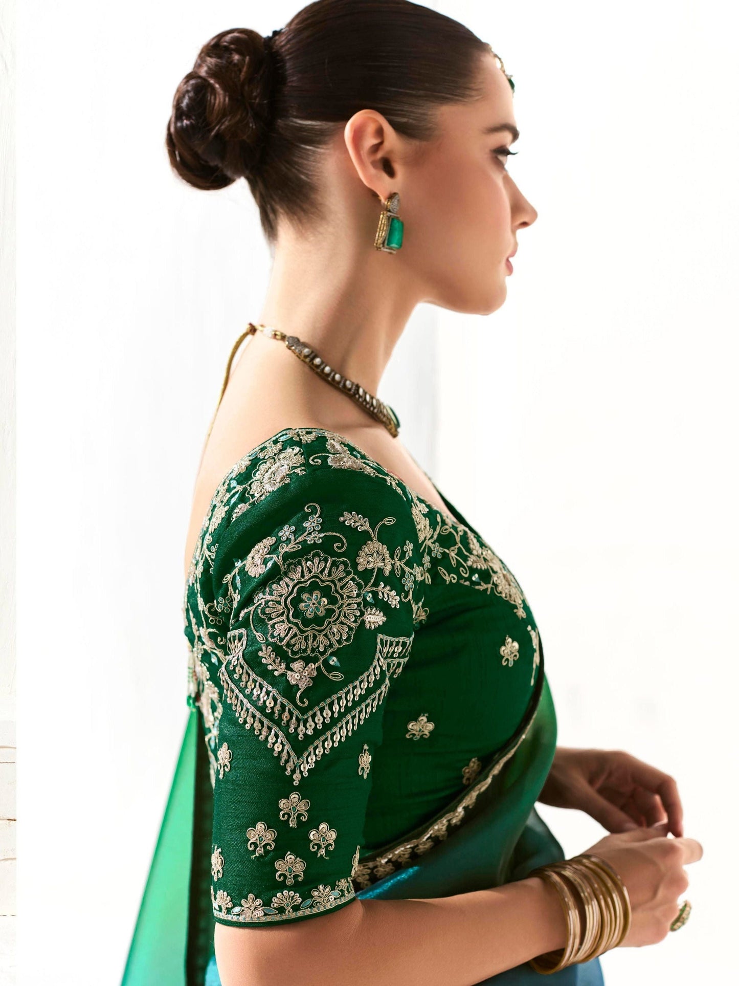 Dhiyona KM Women Peacock-Inspired Tissue Silk Organza Saree With Epeacock-Inspired Tissue Silk Organza Sareembroidered Blouse