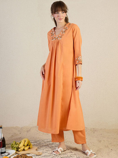 Women Floral Embroidered Cotton Kurta with Trousers
