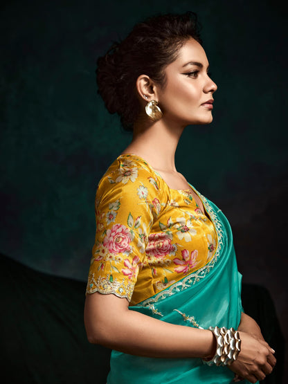Dhiyona KM Women Teal Designer Organza Saree With Handcrafted Embroidered Border “ Bold, Elegant, Unforgettableteal Green Designer Organza Silk Saree
