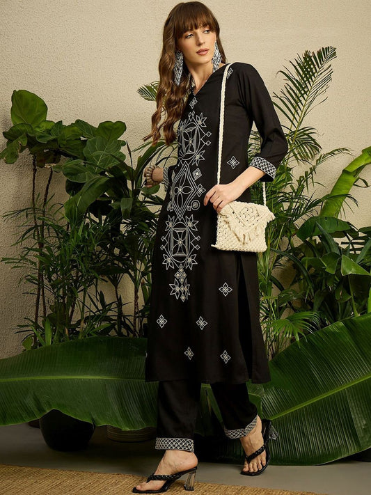 Women Embroidered Regular Thread Work Kurta with Trousers