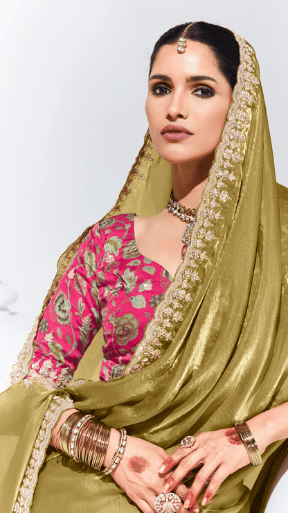 Dhiyona KM Women Olive Green Silk Saree With Embroidered Blouse “ A Timeless Ethnic Statement