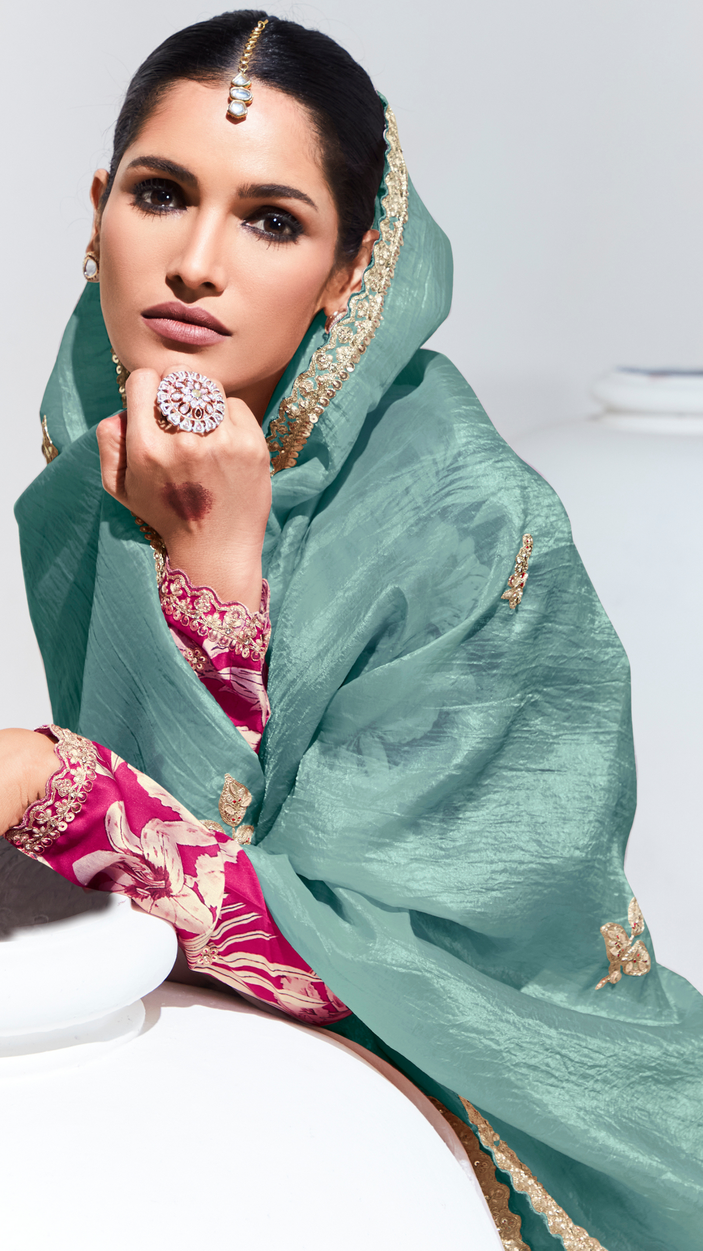 Dhiyona KM Women Teal Pure Tissue Silk Saree With Crushed Finish & Contrasting Red Blouse