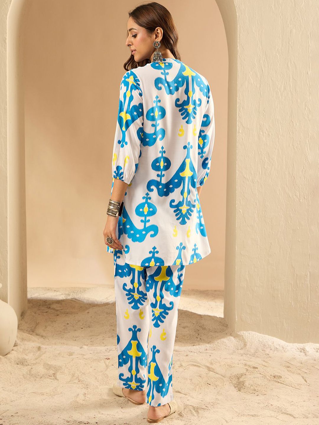 Dhiyona IE Women Printed Regular Kurta with Trousers