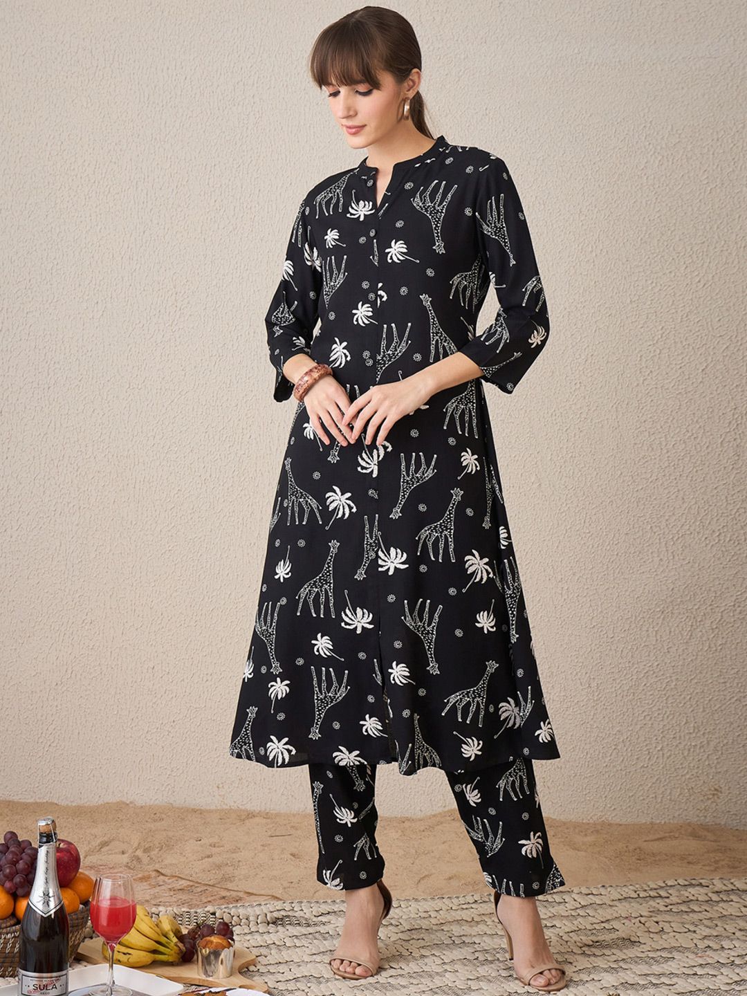 Quirky Printed Mandarin Collar A-Line Kurta With Trousers