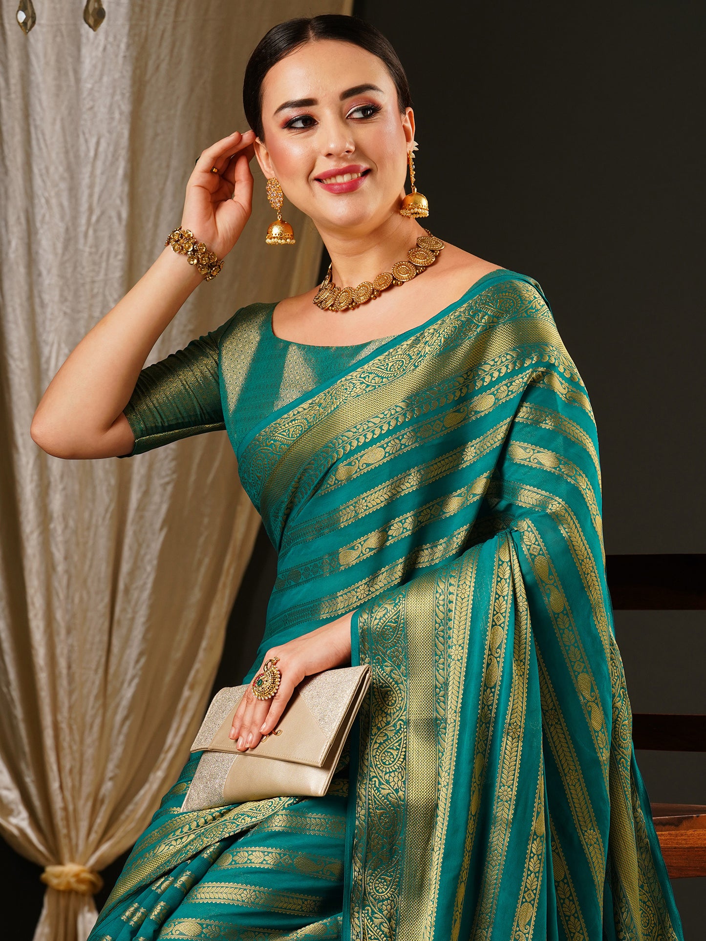 Women's Georgette Blue Woven Design Celebrity Saree With Blouse Piece