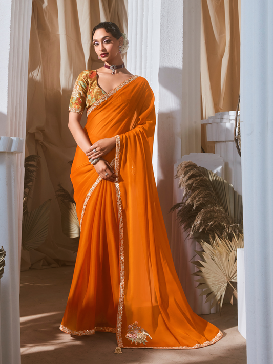 Dhiyona KM Women Orange Saree: Effortless Elegance For Every Occasion