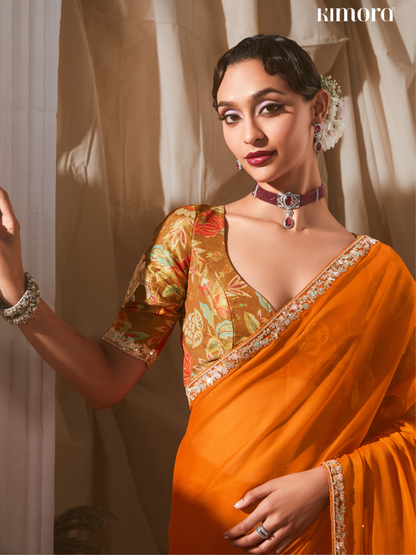 Dhiyona KM Women Orange Saree: Effortless Elegance For Every Occasion