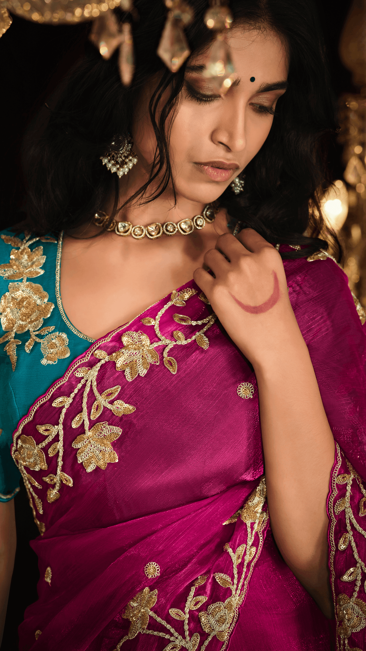 Dhiyona KM Women Red Hand-Embroidered Saree With Teal Blouse