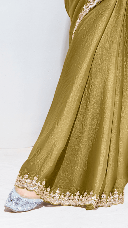 Dhiyona KM Women Olive Green Silk Saree With Embroidered Blouse “ A Timeless Ethnic Statement