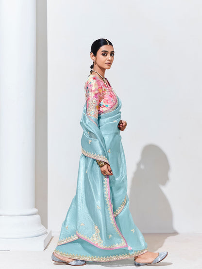 Dhiyona KM Women Sky Blue Silk Saree With Floral Blouse “ A Dreamy Ethnic Attire