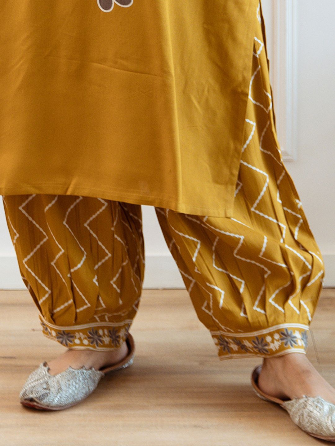 Women Embroidered Regular Beads and Stones Kurta with Trousers