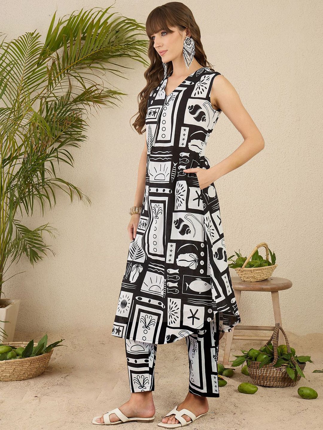 Dhiyona IE Women Geometric Printed Aline Calf Length Kurta with Trousers