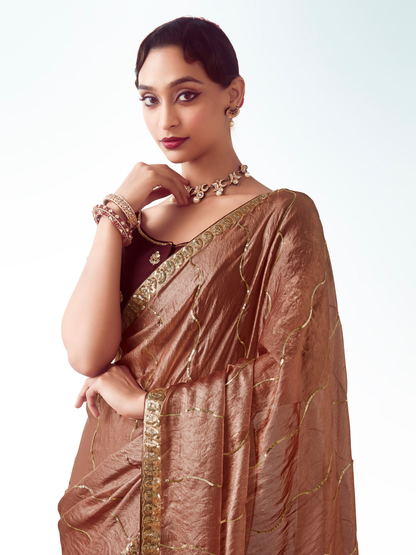 Dhiyona KM Women Rose Gold Silk Saree