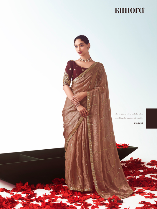 Dhiyona KM Women Rose Gold Silk Saree
