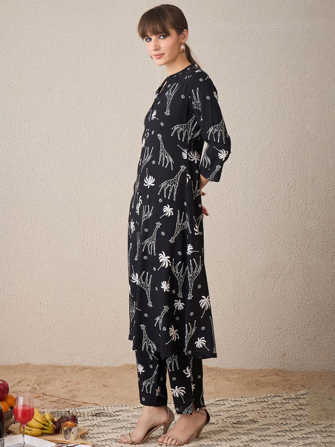 Quirky Printed Mandarin Collar A-Line Kurta With Trousers