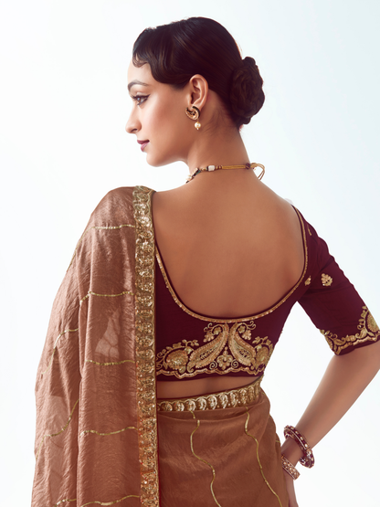 Dhiyona KM Women Rose Gold Silk Saree