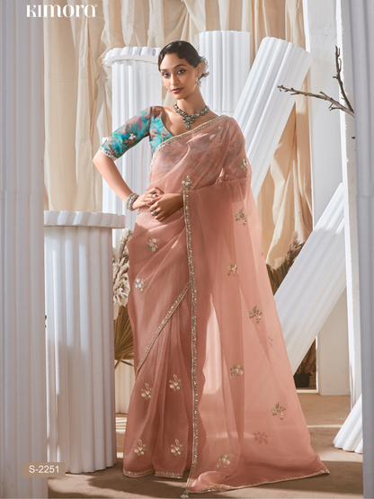 Dhiyona KM Women Peach Designer Organza Saree: Effortless Elegance For Every Occasion