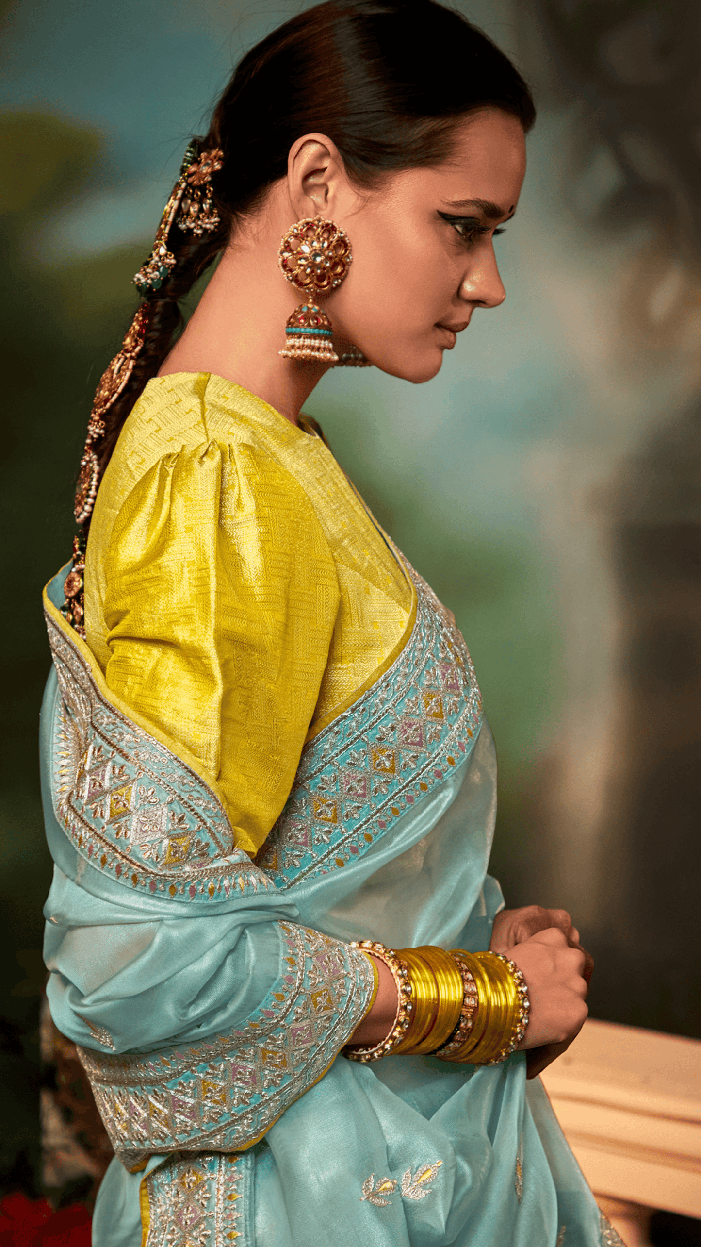 Dhiyona KM Women Sea Green Organza Saree