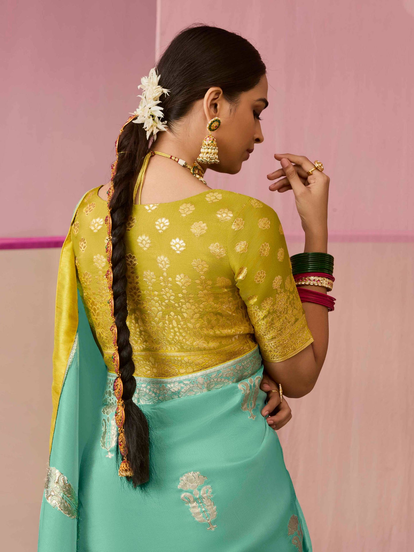 Dhiyona KM Women Sea Green Dola Silk Saree With Yellow Golden Embroidered Blouse