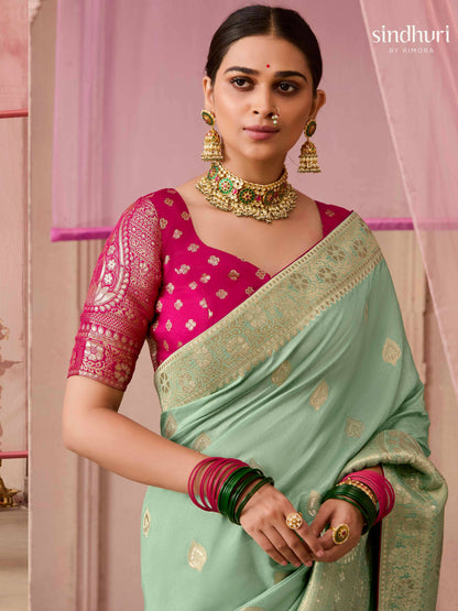 Dhiyona KM Women Sea Green Dola Silk Saree With Red Golden Embroidered Blouse