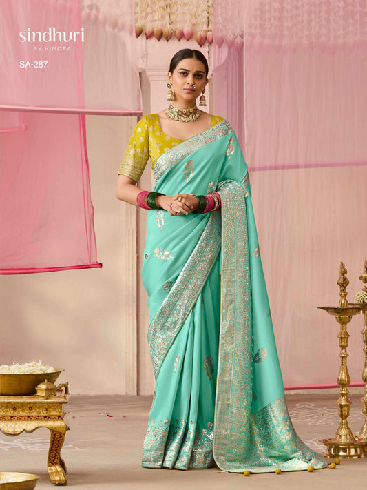 Dhiyona KM Women Sea Green Dola Silk Saree With Yellow Golden Embroidered Blouse